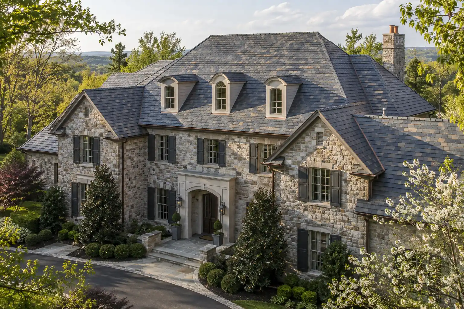 Great Falls roofing guide illustration of a Virginia estate with slate roof planes, hips, and dormers